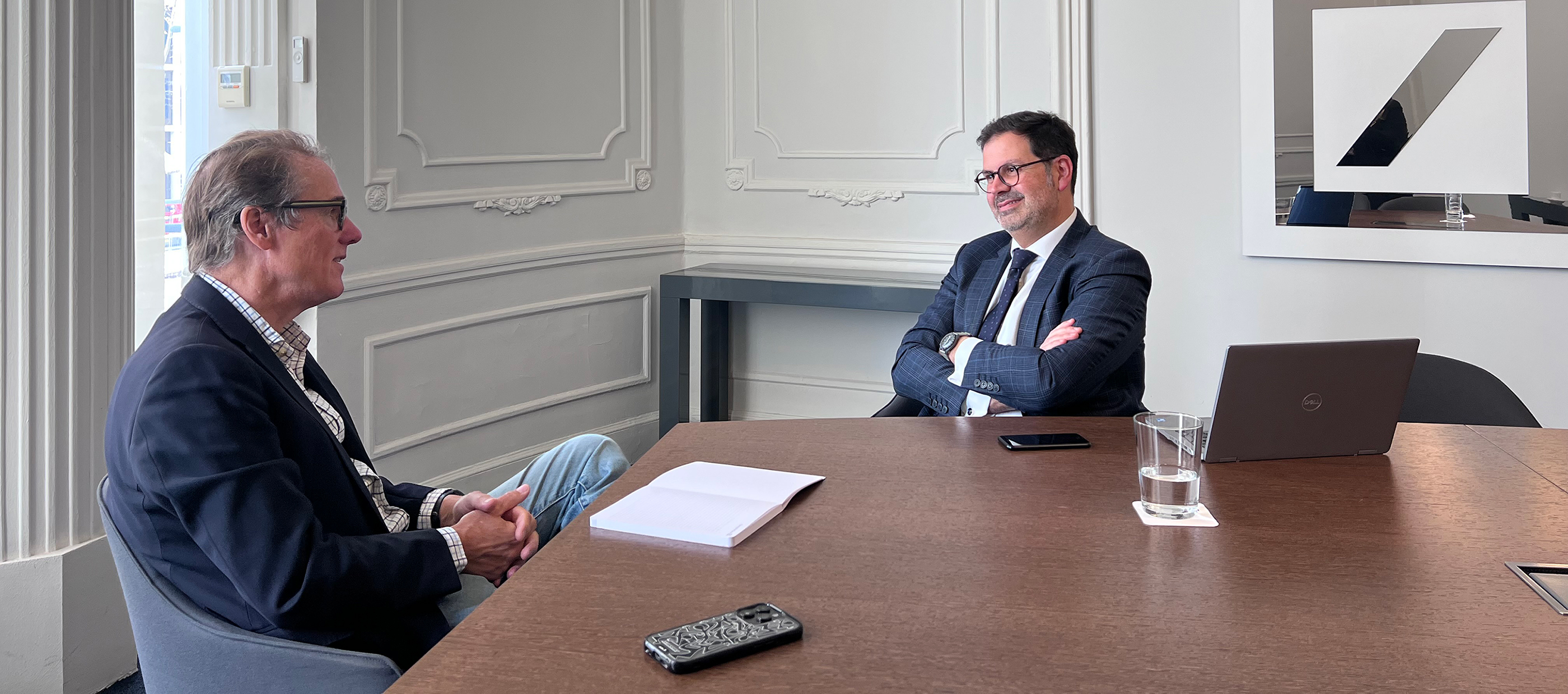 Decorating image of Tim Eaves and Francisco Lopera sitting at a desk