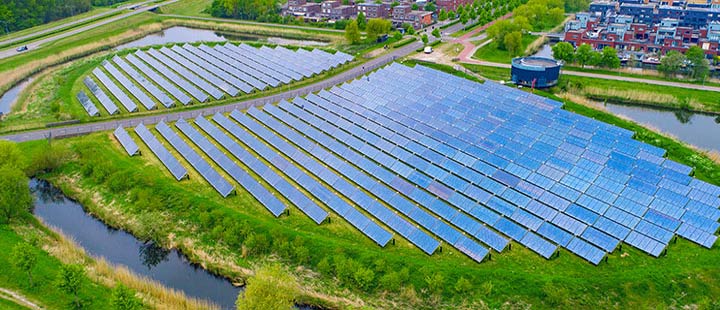 Solar panels aerial view. Innovative solar panel island in Almere, Netherlands. Modern sustainable residential area.